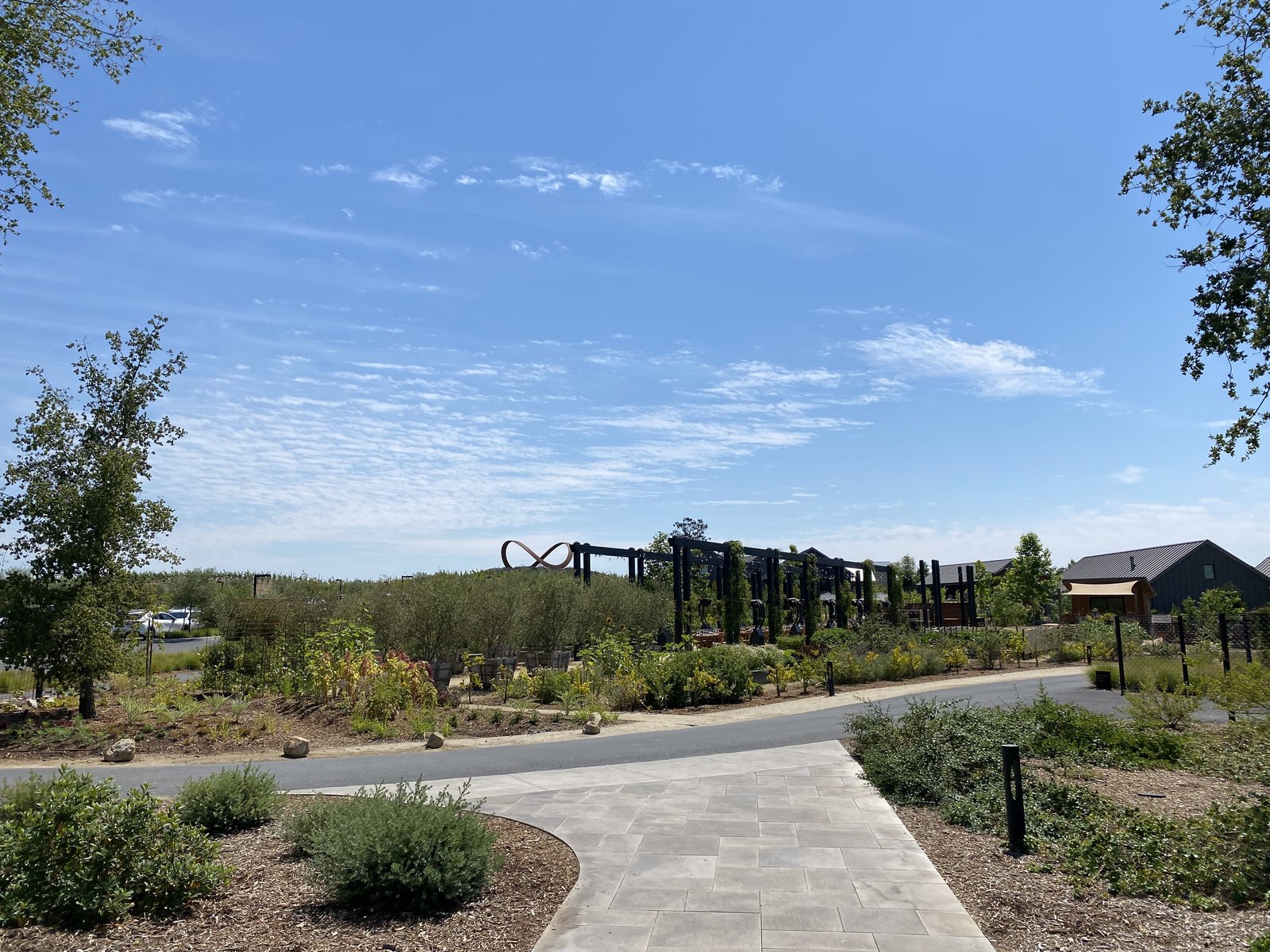 The garden path leading to the steel arch sculpture at Stanly Ranch